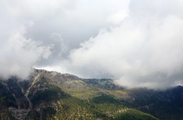 Spring cloudy view of slope of Aj-Petri Mount (Ukraine) — Stock Photo, Image