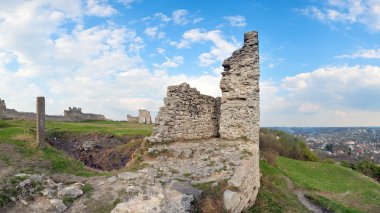 Summer view of ancient castle ruins ( Kremenets city , Ternopil Region, Ukraine). Built in 12th century. Four shots stitch image. clipart