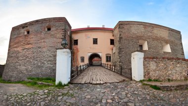 Spring Zolochiv castle bridge gate view (Ukraine) clipart