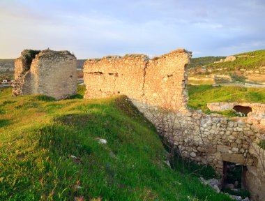 Summer sunset view of ancient Crimean fortress (near Sevastopol Town, Crimea, Ukraine) clipart