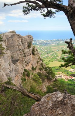 Yalta city view from slope of Aj-Petri Mount and cross on rock (trail Botanical, Crimea, Ukraine) clipart