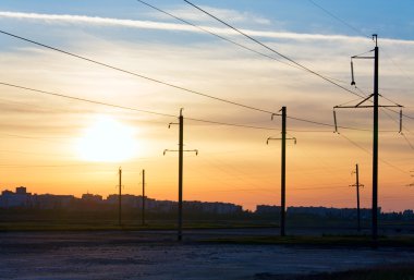 Sunset and high-voltage line clipart