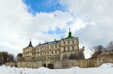 Spring panorama view of old Pidhirtsi Castle (Ukraine, Lvivska Region, built in 1635-1640 by order of Polish Hetman Stanislaw Koniecpolski). Five shots stitch i clipart