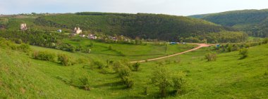 Spring view of Chervonohorod Castle ruins ( Nyrkiv village , Zalischyky Raion, Ternopil Oblast, Ukraine). Built in early 17th century. Two shots stitch image. clipart