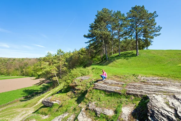 Spring landscape and woman on hill. — Stock Photo, Image