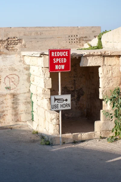 stock image A signpost in the ruins