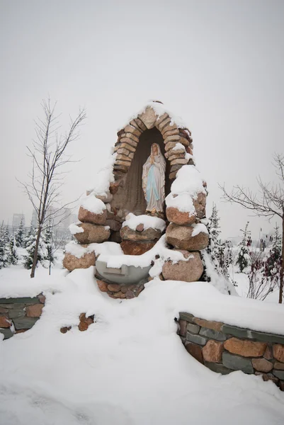 stock image The Holy Mary - Fatima Figure in winter