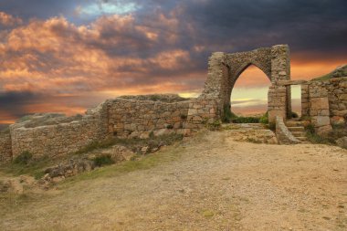 Ancient castle at dusk clipart