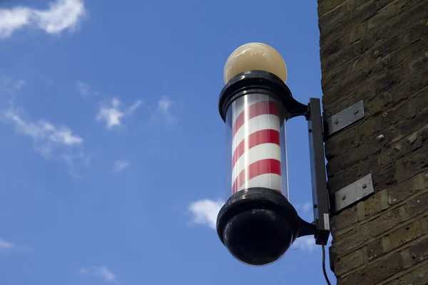 Barber's pole and sky (room for text) — Stock Photo, Image