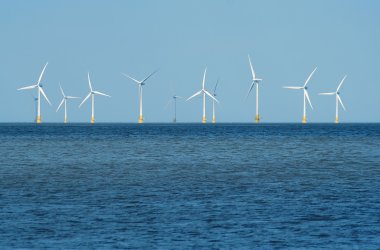 Wind farm in sea clipart