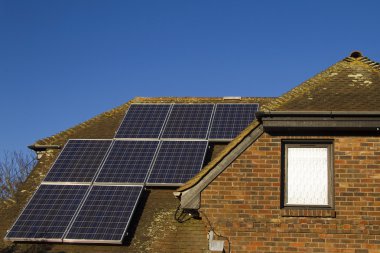 Solar panels on home clipart