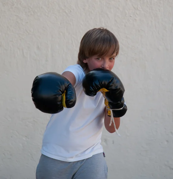 Boxing gloves on children hands . — Stock Photo, Image