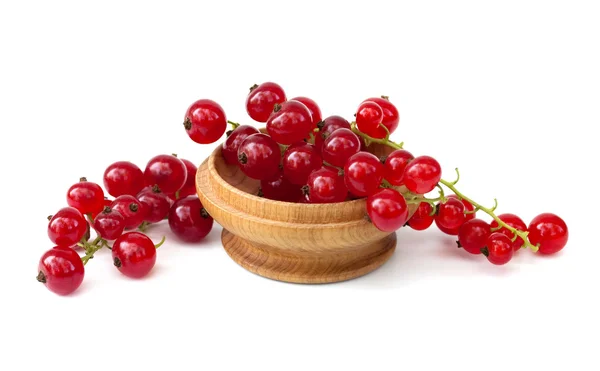 Red currants in a wooden bowl — Stock Photo, Image