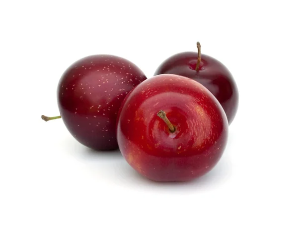 Three fresh ripe plums — Stock Photo, Image