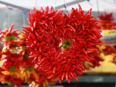 Red peppers shaped into a heart.