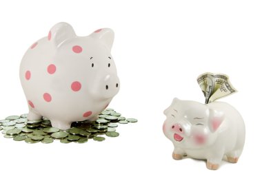 Piggy bank on coins stares at another piggy bank holding a 100 dollar bill. clipart