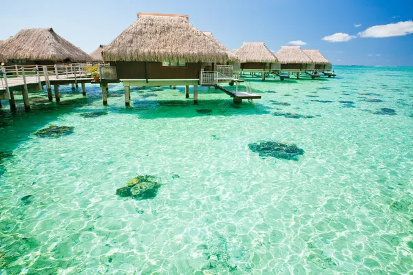 Over water bungalow with steps into amazing lagoon — Stock Photo, Image