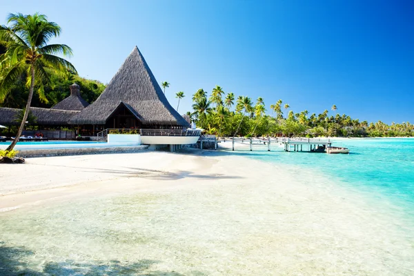 stock image Jetty and boat on tropical beach with amazing water