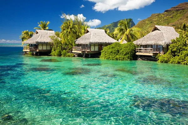 Over water bungalow with steps into amazing lagoon — Stock Photo, Image