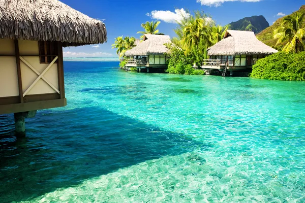 Over water bungalows with steps into amazing lagoon — Stock Photo, Image