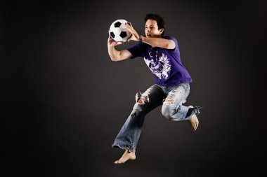 Soccer playing catching a ball clipart