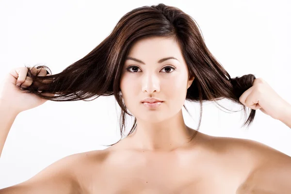 Beautiful Natural Asian Woman Pulling Dark Hair — Stock Photo, Image