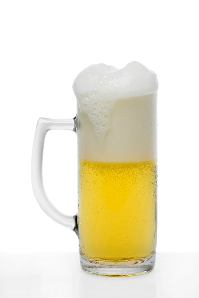 Glass of beer with froth — Stock Photo, Image