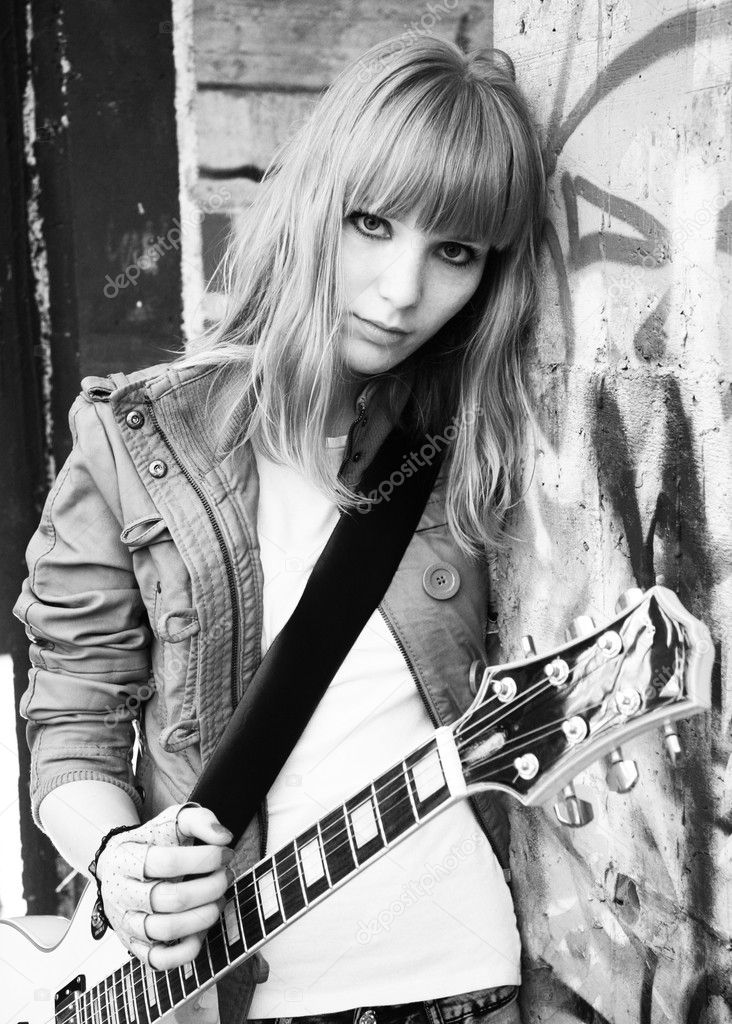 Girl plays guitar