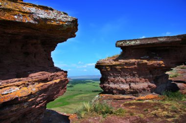 View of blue sky between the cliffs clipart