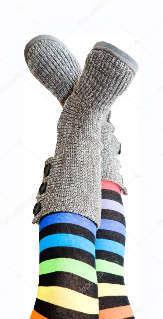 Stripy legs - female legs in brightly colored stockings and knit