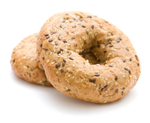 stock image Two multigrain bagels; isolated on white;