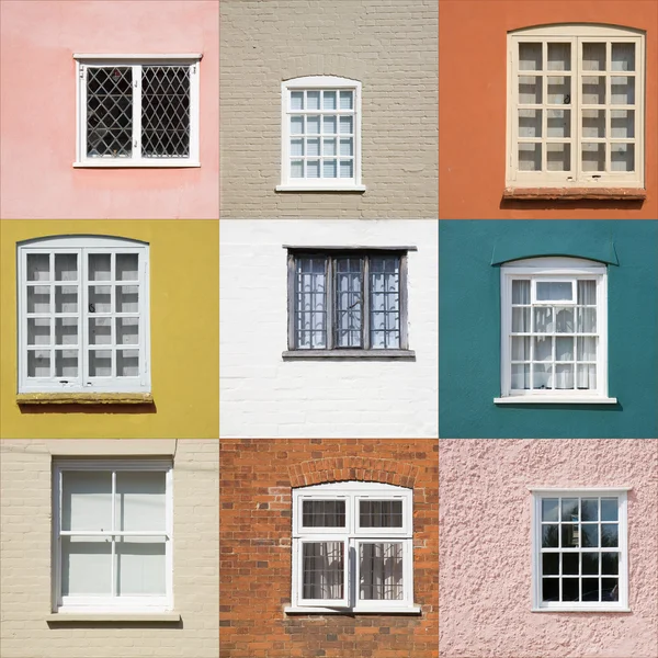 Sammlung alter Fenster an verschiedenfarbigen Wänden — Stockfoto