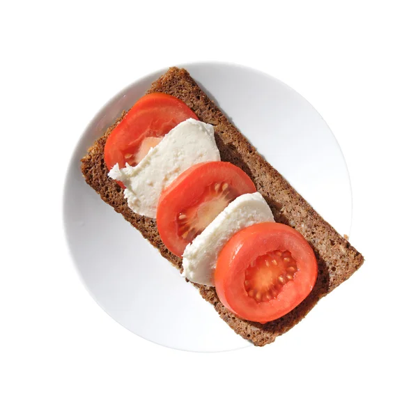 Mozarella and tomato open sandwich on multigrain bread — Stock Photo, Image