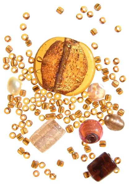 stock image Selection of beads in amber color scheme, isolated