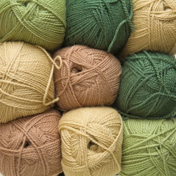 Sfondo con palline di lana, armonizzato a colori — Foto Stock