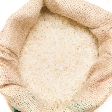 Fine long-grained basmati rice in a burlap sack clipart