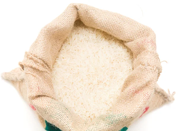 Fine long-grained basmati rice in a burlap sack — Stock Photo, Image