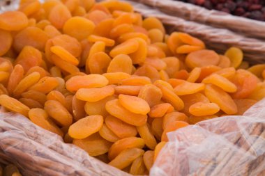 Dried apricot for sale at a marketplace clipart