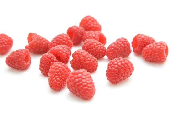 Handful of fresh raspberries isolated on white background; — Stock Photo, Image