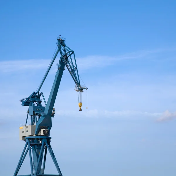 stock image Seaport crane, blue, sky, large, big, tall, heavy, lift, weights, beautiful, construction, work, equipment,