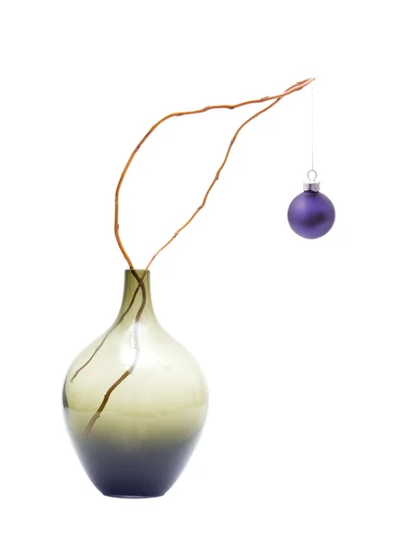 Christmas table decoration with slaix branch and a bauble in a v — Stock Photo, Image