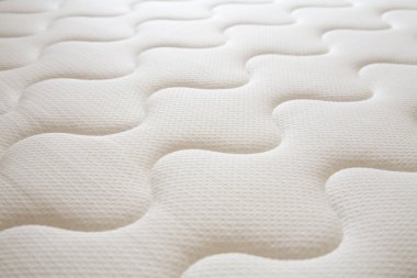 Brand new clean spring mattress surface clipart