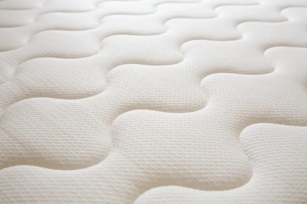 全新的清洁弹簧床垫表面 — 图库照片
