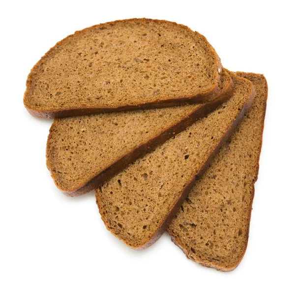 Τέσσερις στοιβάζονται fanned φέτες ψωμί σίκαλης με κύμινο σπόρους που απομονώνονται σε Γουίτ — Φωτογραφία Αρχείου
