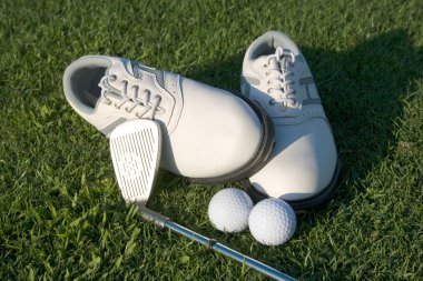 Golf accessories on the grass green clipart