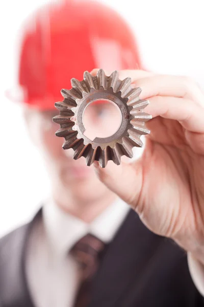 Engineer and a gear — Stock Photo, Image