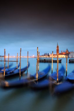 Gondolas anchored on Grand Canal in Venice clipart