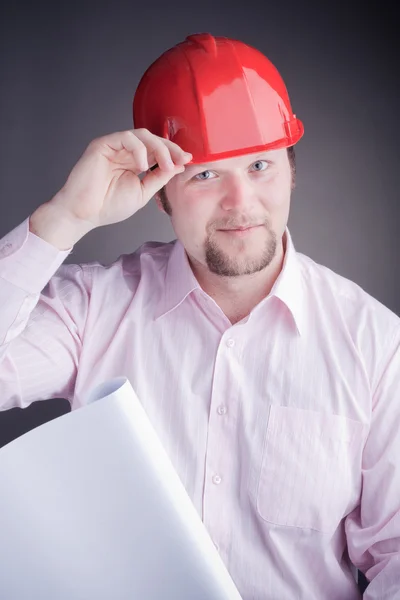 Young Engineer Blueprints Raises His Hat — Stock Photo, Image