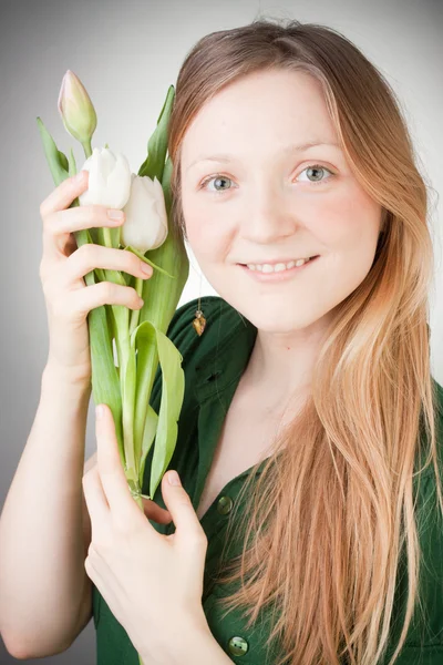 stock image Young girl with tulips