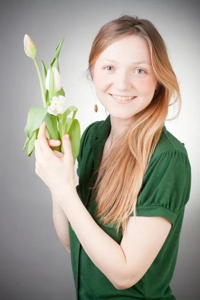 Stock image Young girl with tulips